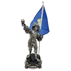 WMF figure, of a man holding a flag and raising a glass, upon a circular base with lion mask decoration, with stamped mark beneath, with flag H44cm