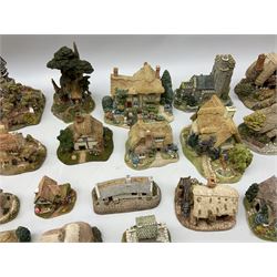 Forty six Lilliput Lane model cottages, to include 'Convent in the Woods', 'Holme Dyke' 'Secret Garden' etc