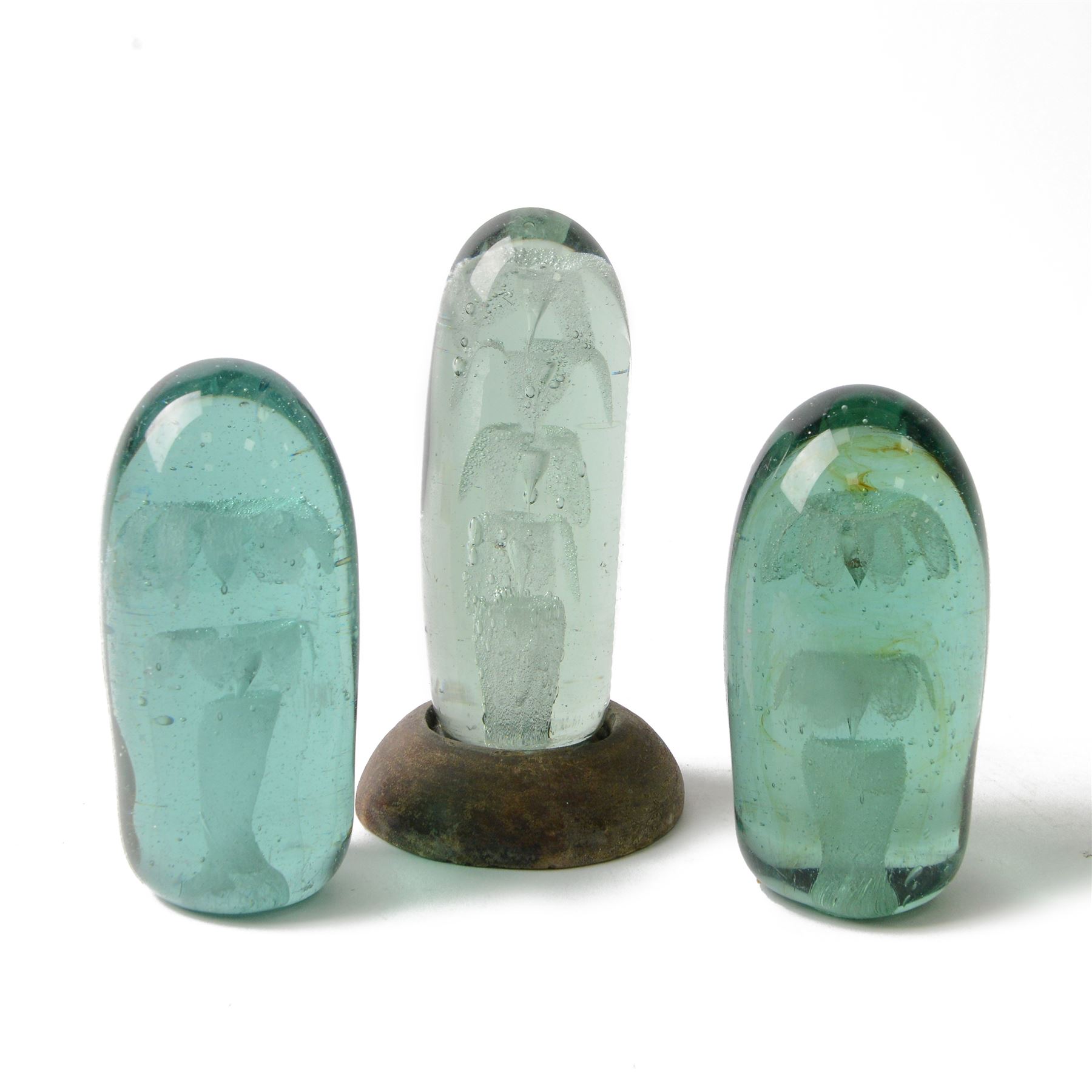 Three Victorian green glass dump paperweights with floral sulphur inclusions, tallest H17cm