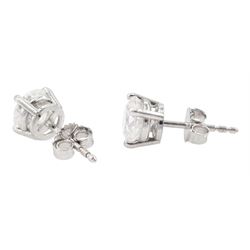 Pair of 18ct white gold round brilliant cut diamond stud earrings, stamped 750, total diamond weight 1.97 carat, with World Gemological Institute Report