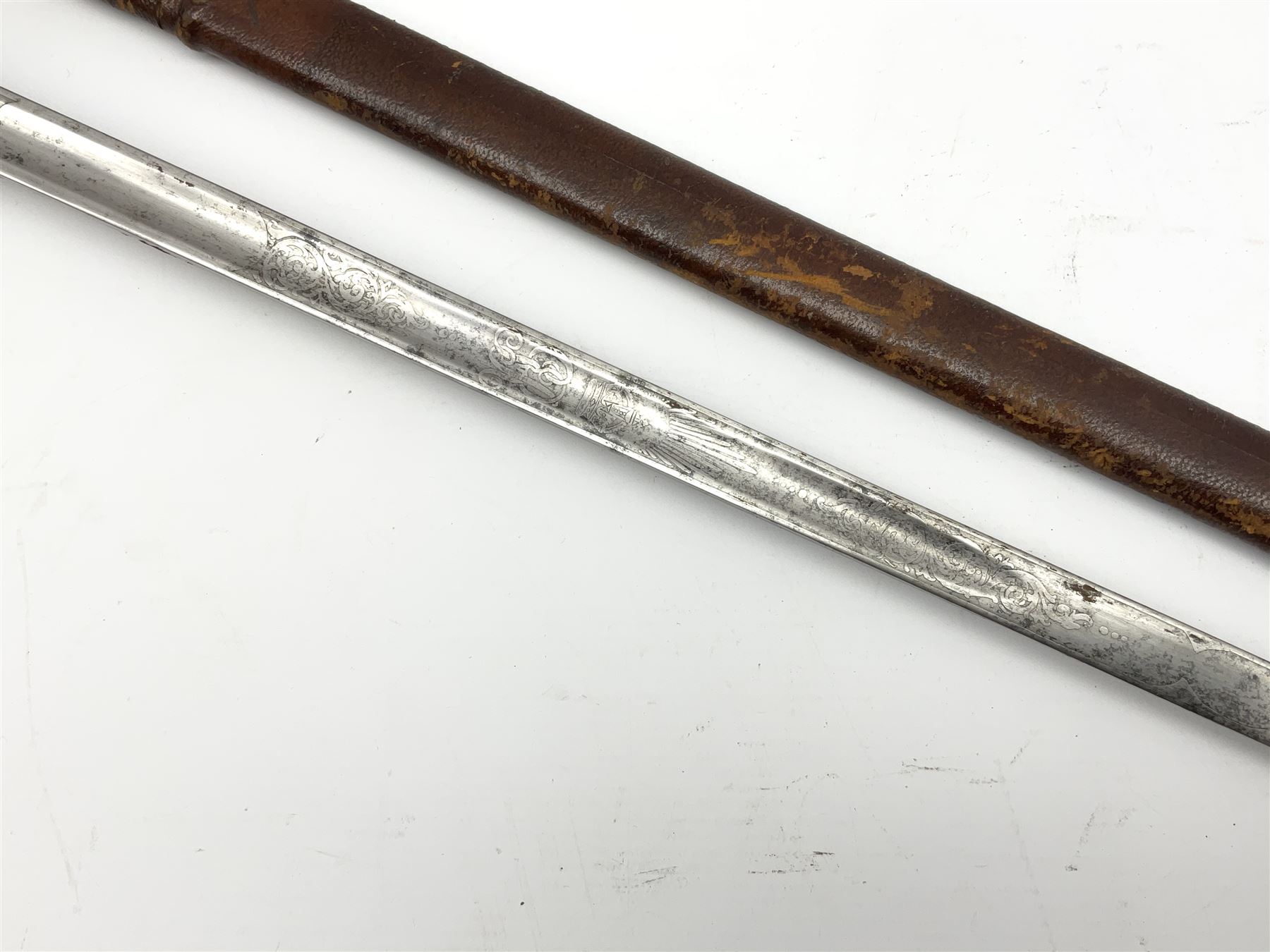 George V 1897 pattern army officer's sword the 82.5cm etched blade by Flights Ltd London, Winchester, Aldershot & Camberley, nickel plated pierced hilt and wire bound fish-skin grip, in leather scabbard, L101cm overall