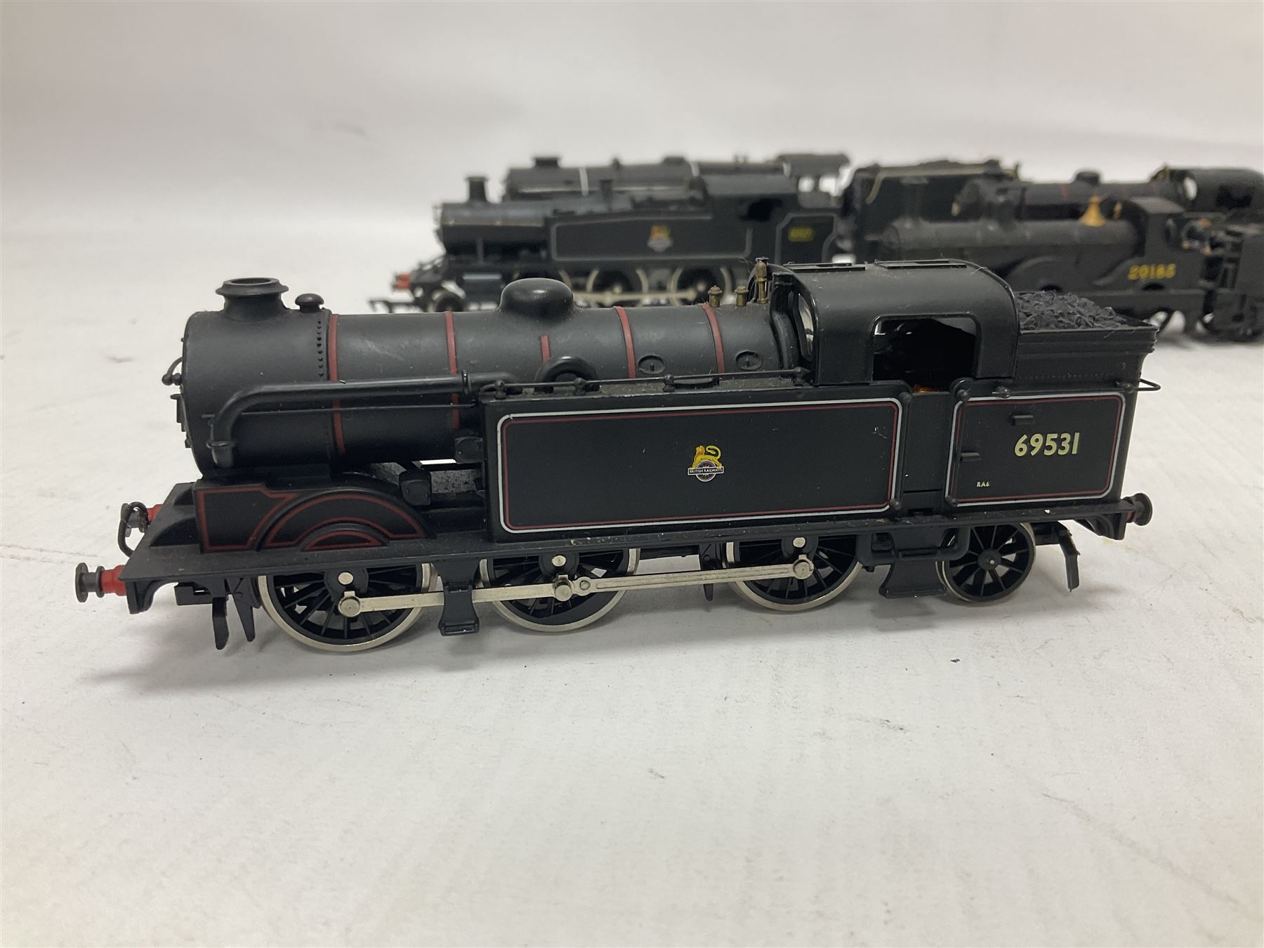 Airfix ‘00’ gauge - seven locomotives comprising Class 7P (Royal Scot) ‘Royal Scots Fusilier’ 4-6-0 no.6103 in LMS black with Mainline tender; two Class N2 0-6-2T no.69531 in BR black; Class 1282 2-4-0 no.20185 in LMS black; Class 61XX 2-6-2T no.6167 in BR black; Class 14XX 0-4-2T no.1466 in GWR green, all unboxed; Class 4F 0-6-0 no.4454 in LMS black, in original box (7)