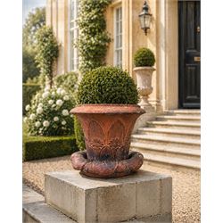 Small 19th century terracotta octagonal planter with stand, flower and leaf design