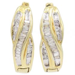 Pair of 14ct gold diamond crossover hoop earrings, each set with tapered baguette and roun...
