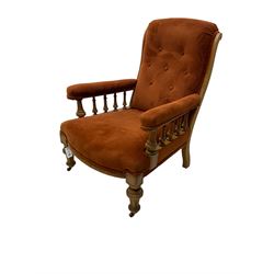 Late 19th century oak drawing room armchair, upholstered in buttoned fabric, turned and fluted supports