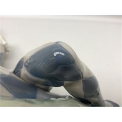 Lladro figure, Harlequin Reclining, modelled as a recumbent harlequin, no 5128, Sculpted by Salvador Furio, year issued 1982, year retired 1987, H28cm 