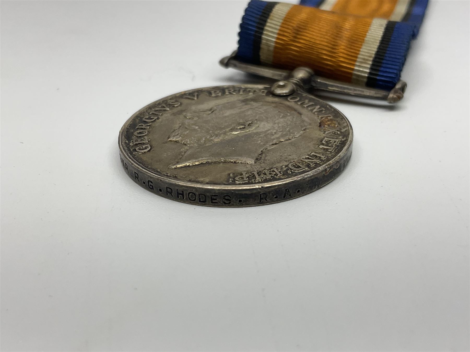 WW1 group of three medals comprising British War Medal, Victory Medal and 1914-15 Star awarded to 90434 Gnr. R.G. Rhodes R.F.A./R.A.; all with ribbons