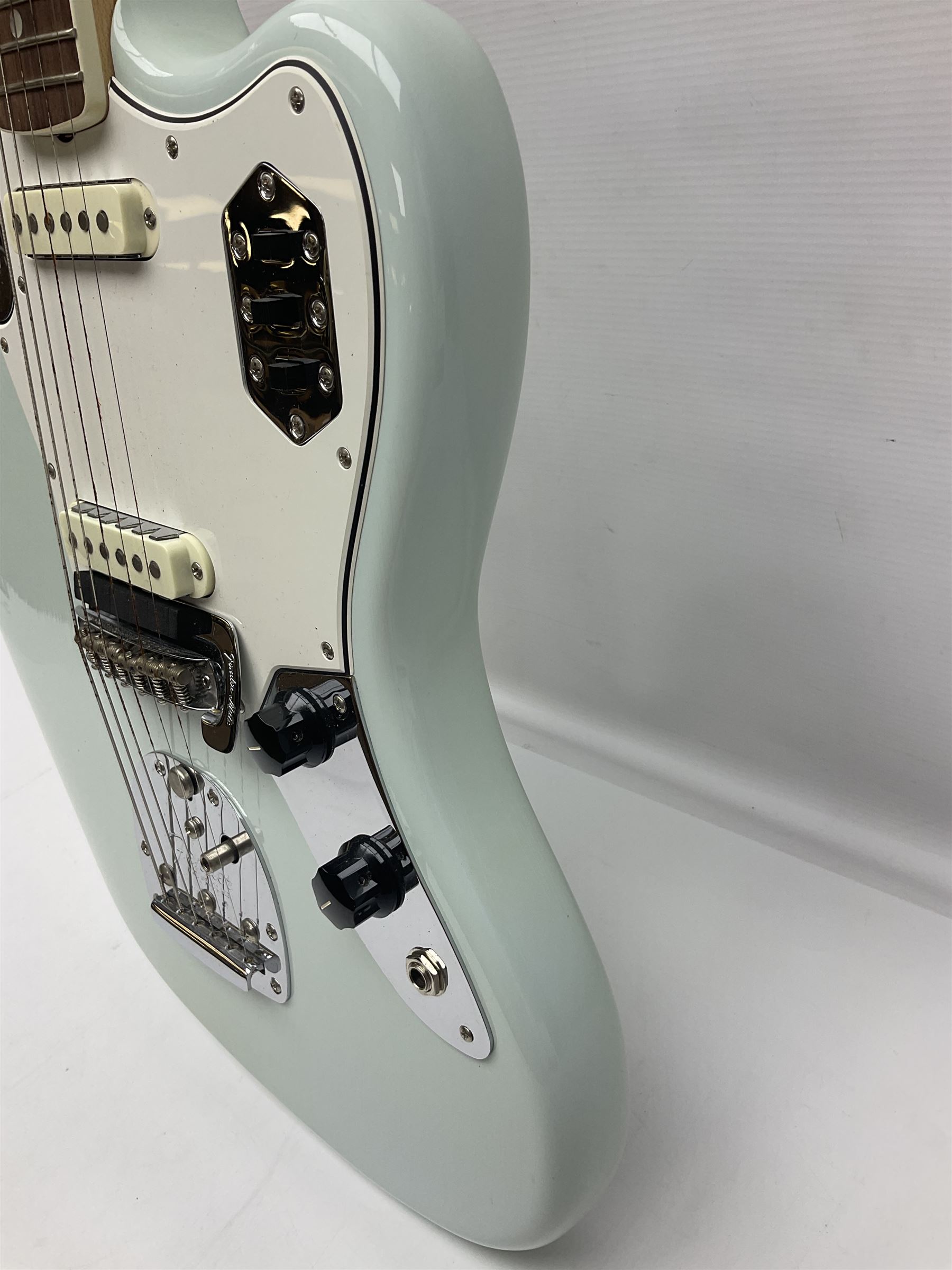 Fender Jaguar electric guitar, American Custom Shop vintage re-issue, probably in seafoam green, with tremolo arm, serial no.V1317106, L101cm; in American G&G Fender fitted hard case with paperwork