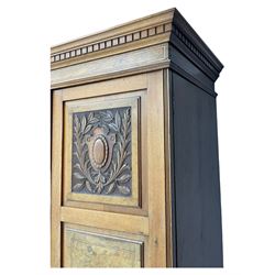 Late Victorian walnut triple combination wardrobe, projecting moulded and dentil cornice, central shaped bevelled mirror glazed door, cartouche and curled leaf carved panels over figured walnut veneered panels, fitted with drawer to base, on bracket feet