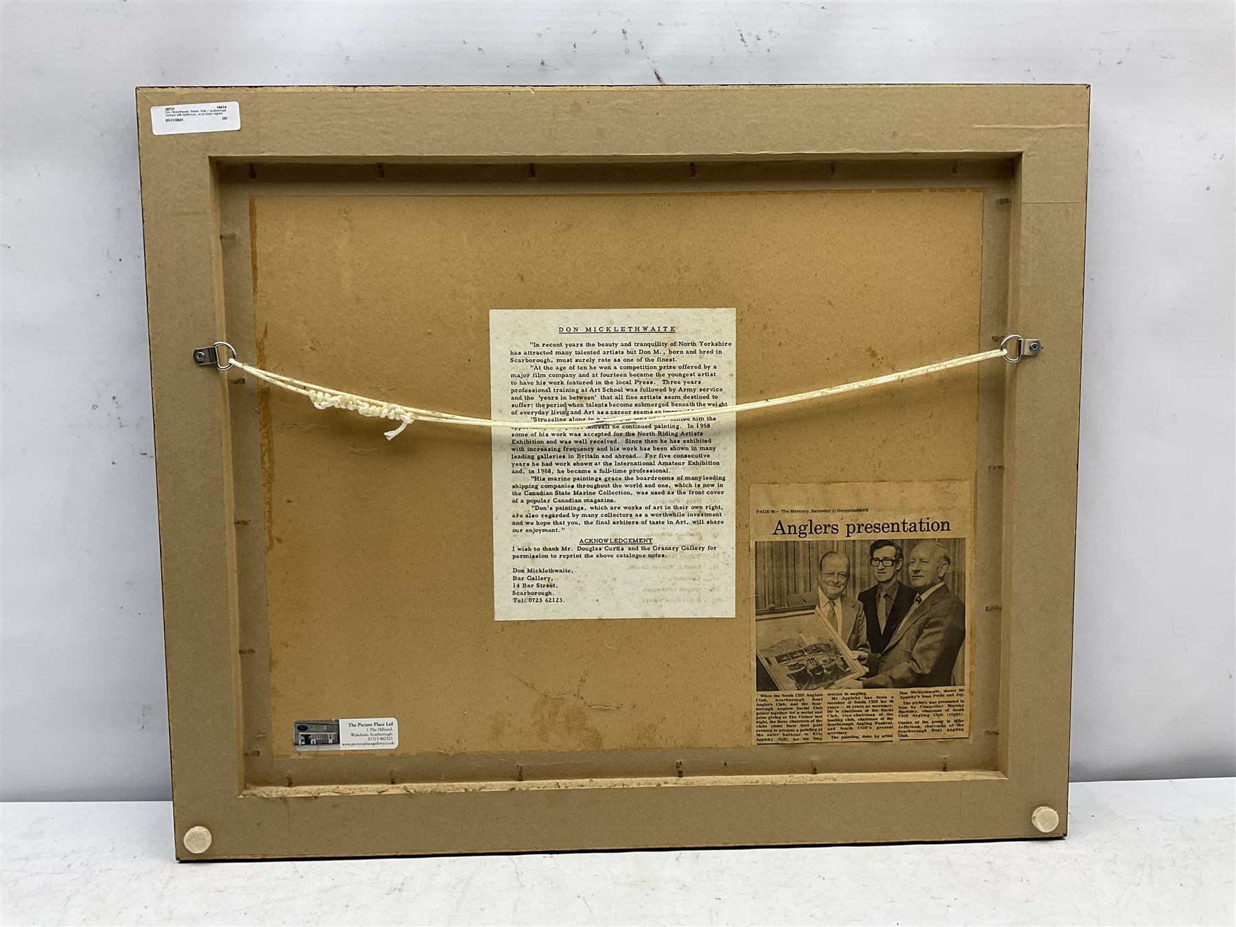 Don Micklethwaite (British 1936-): Scarborough Harbour with lighthouse, oil on board signed 39cm x 50cm