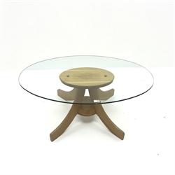  Contemporary solid oak coffee table with a 10mm plate glass top, four sabre supports joined by single undertier, W105cm, H45cm, D67cm  