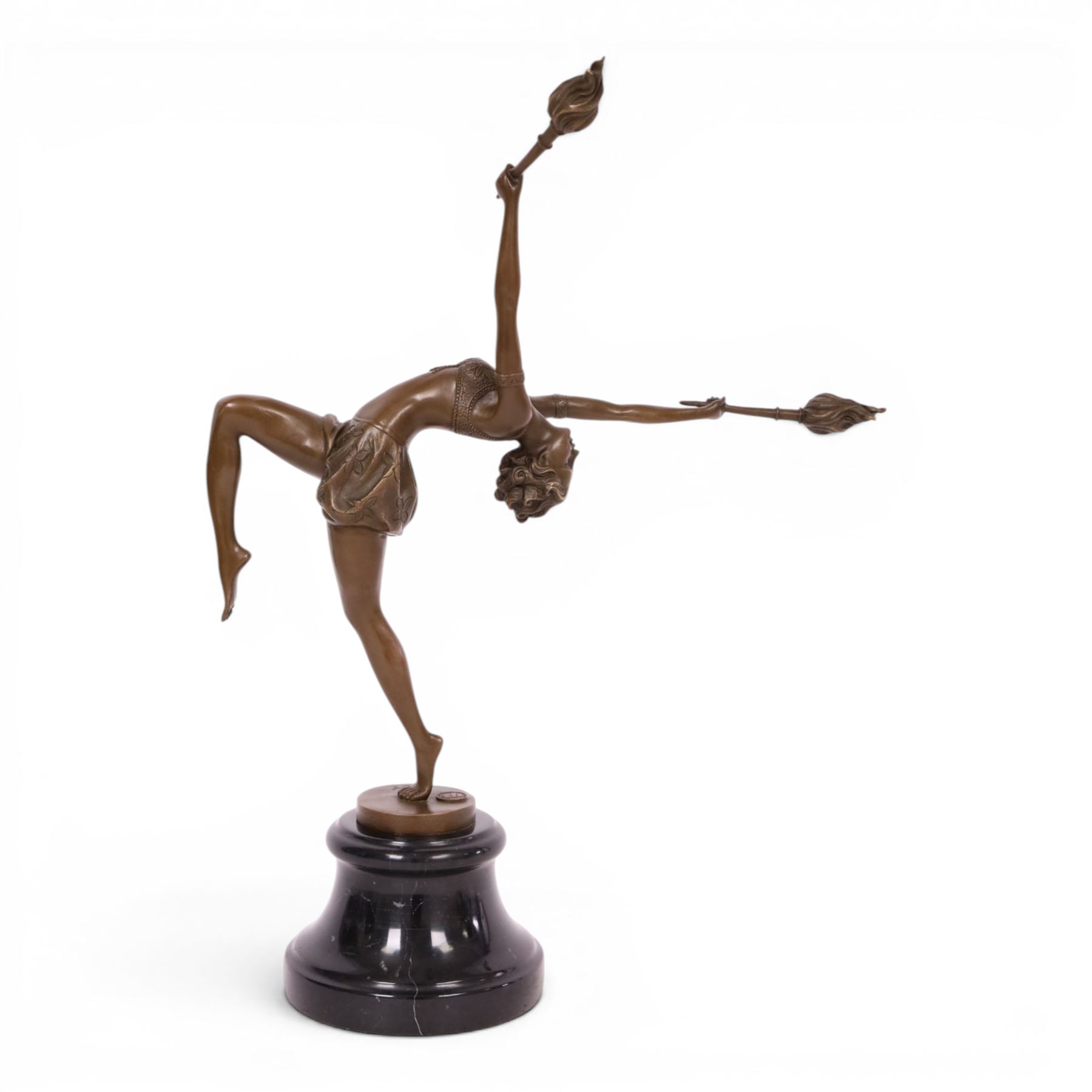 Art deco style bronze figure of a female dancing with flame torches, raised upon marble base, signed Nick, H43cm 