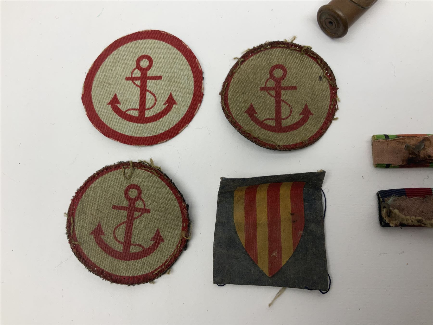 WW1 Short & Mason Ltd 'The Magnapole' black japanned brass field compass in leather carrying case; WW1 trench art paper knife inscribed Dixmude; and small quantity of cloth badges etc