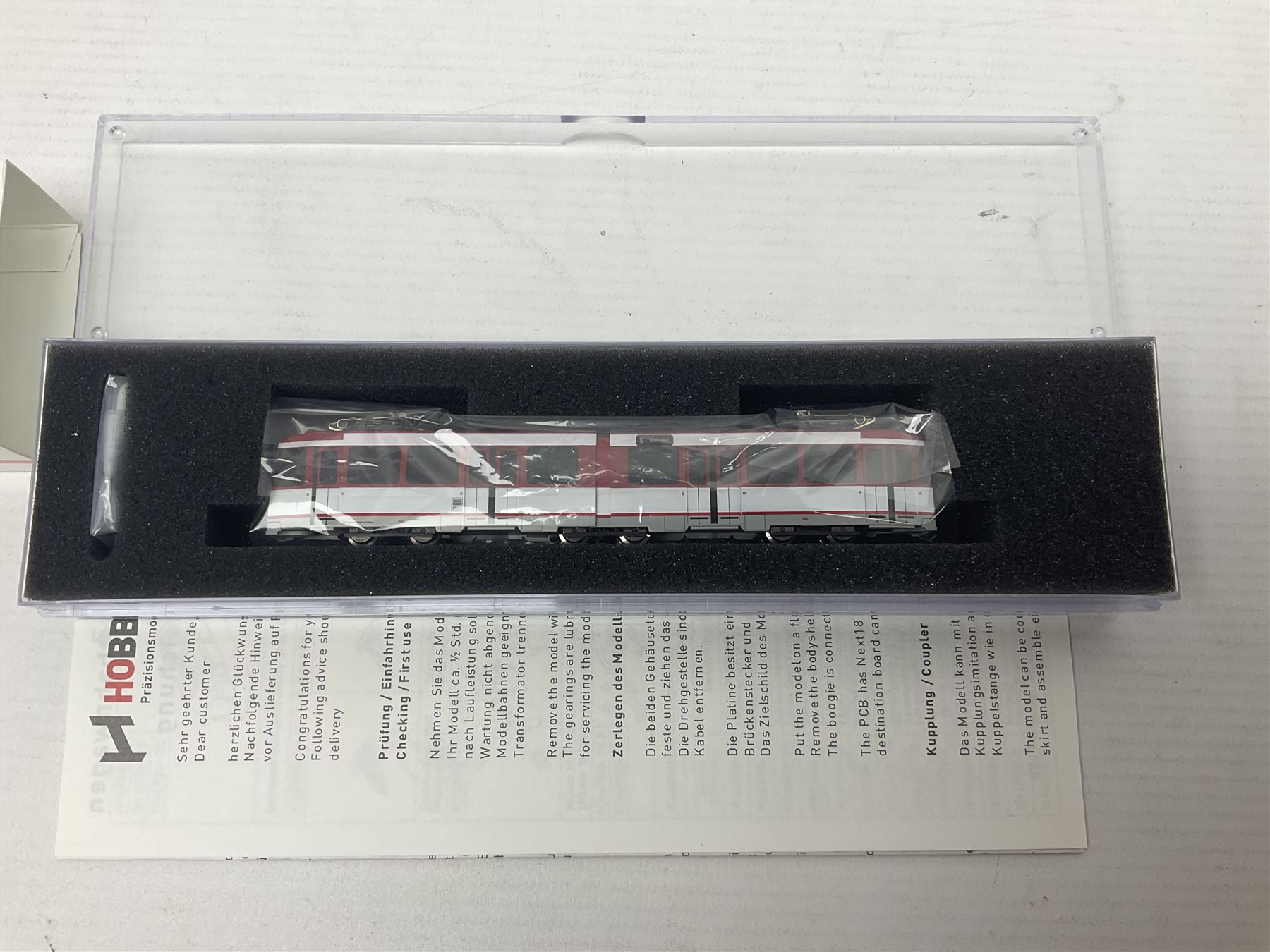 Hobbytrain 'N' gauge - three locomotives - H2970 Vectron Ep.VI CargoServ; H14902 Strassenbahn Duwag M6 Muhlheim/Ruhr; and H14903 Strassenbahn Duwag M6 Nurnberg; all boxed (3)