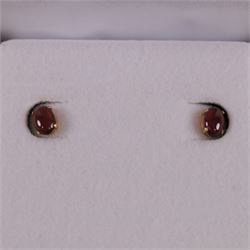Pair of 9ct gold oval garnet stud earrings, boxed, H6mm