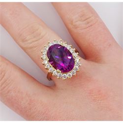 14ct gold synthetic purple sapphire and cubic zirconia cluster ring, stamped 14K