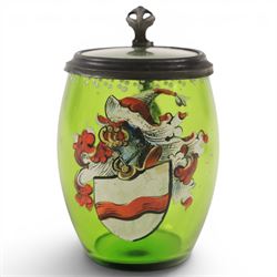 19th century German green glass stein, enamel decorated with a gentleman holding a stein, with a pewter lid, together with another smaller example decorated with a coat of arms 