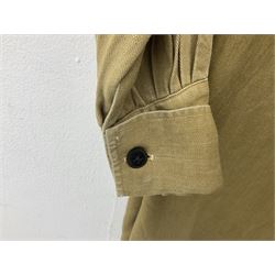 1930s Hitler Youth brown shirt, long length with two pockets, bears triangular badge 'Nord Nordsee'