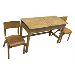 Mid-20th century beechwood school desk, rectangular lift-top desk with storage compartment, supported by square legs with cross stretchers; two matching beech chairs (3)
