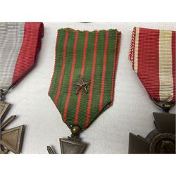 Six French medals - 2nd Empire Louis-Naploeon Medaille Militaire Valeur Et Discipline; 1870 3rd Republic Medaille Militaire Valeur Et Discipline; WW1 Croix-De-Guerre with MID star; WW2 Theatres D'Operations Exterieurs Croix-De-Guerre; WW1 Commemorative Medal; and Croix De La Valeur Militaire; all with ribbons (6)