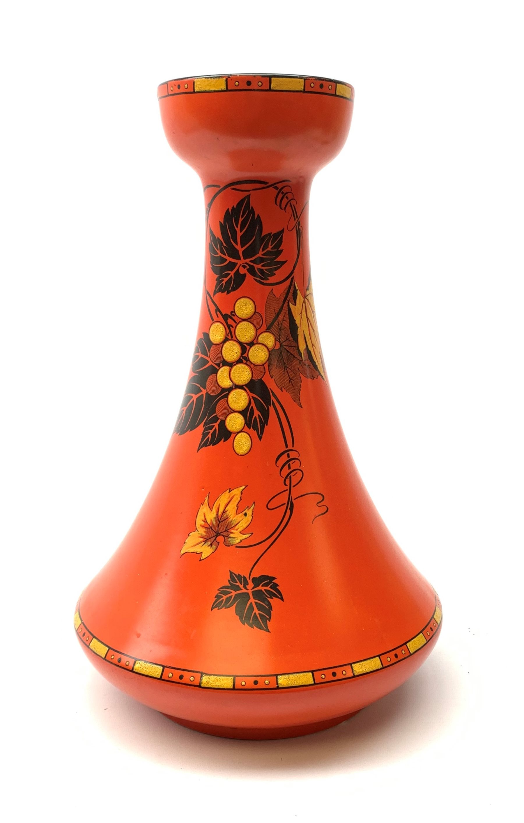 A large Shelley vase, of bulbous form with waisted neck and flared rim, the red ground decorated with the Vine and Grape pattern, with printed mark beneath and painted pattern no 8632, H41cm. 