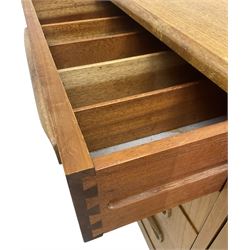 G-Plan – teak sideboard, four central drawers flanked by two double cupboards, enclosed by panelled doors 