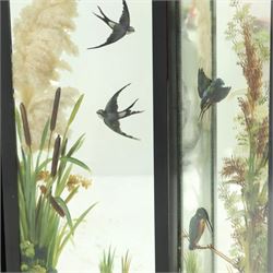 Late Victorian Aesthetic Movement ebonised and painted three-panel folding mirror screen, spindle gallery cresting rail over three rectangular mirror plates painted with floral pond scenes with lily-pads, swallows and kingfishers, each panel W37cm H110cm)