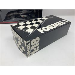 Four Minichamps 1:18 scale die-cast racing cars - Williams F1 Team BMW FW26 R. Schumacher; McLaren Mercedes MP4-12 D. Coulthard; McLaren Mercedes MP4-13 M. Hakkinen; and Formel 1 Jordan peugeot EJR 195 E. Irvine; all boxed (4)