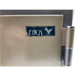 Cock fireproof combination safe, with key and instructions