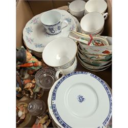 Nine Goebel Hummel figures, cuckoo clock, Colclough part tea service, Nao figure, Country Companions figure, etc, in two boxes 