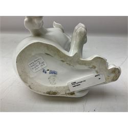 Royal Copenhagen figure of a pointer puppy, modelled seated with rare white and brown patch colourway, designed by Erik Nielsen, model no 259, date code for 1889-1922, with printed and painted marks beneath, H19cm