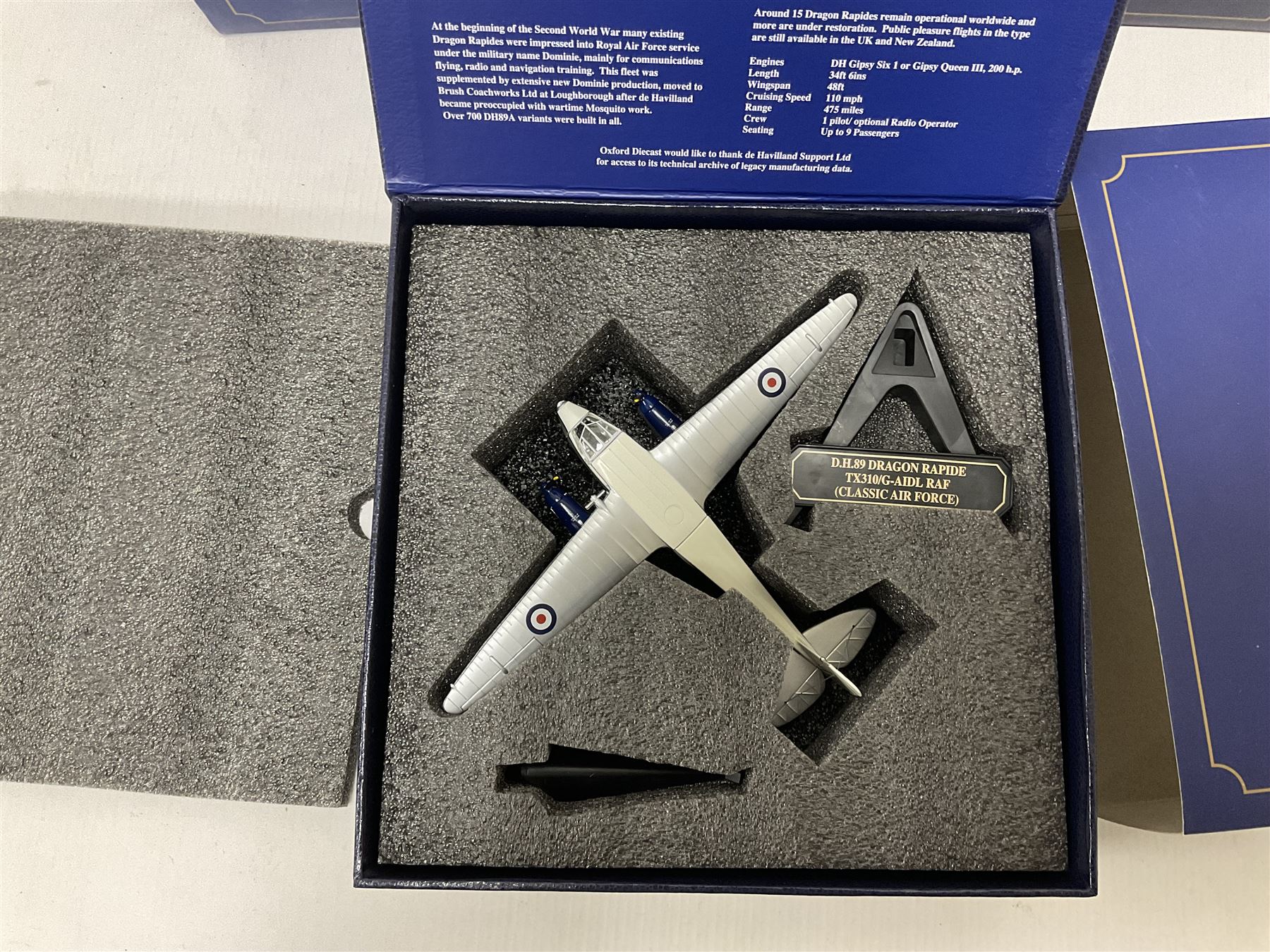 Oxford Die-Cast - four 1:72 scale model planes comprising two DH89 Dragon Rapide 72DR007 Z-7258/G-AFMH (RAF Air Ambulance) and 72DR008 0G-AIDL (Classic Air Force); De Haviland Devon C1 72DV003 VP975 Royal Aircraft Establishment; Avro Anson Mk1 72AA002 217 Sqn. RAF Coastal Command; in original boxes (4) 