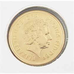 Queen Elizabeth II 2001 gold full sovereign coin, housed in a commemorative cover