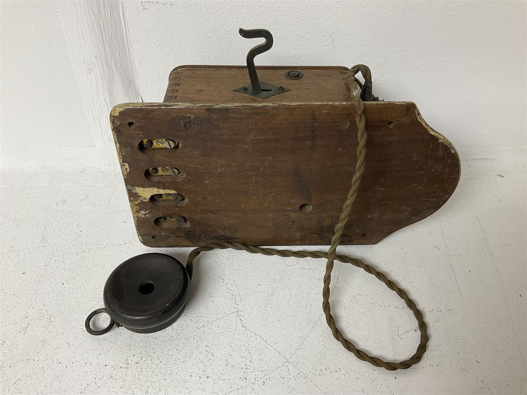 Two Hunningscone patent wall mounting telephones in walnut casing, together with Sterling Telephone & Electric Co. Ltd early wall-mounted telephone 'Primax' and one other 