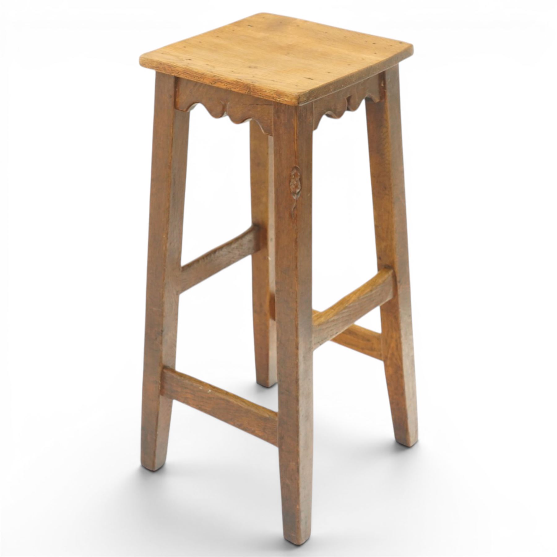 Mouseman - circa 1940/50's oak bar stool, dished square top with shaped apron, raised on four tapering square legs, joined by rails, with carved mouse signature, by Robert Thompson of Kilburn, initialled with provenance from the Old Hall, Thornton-le-Dale, North Yorkshire, further info to follow