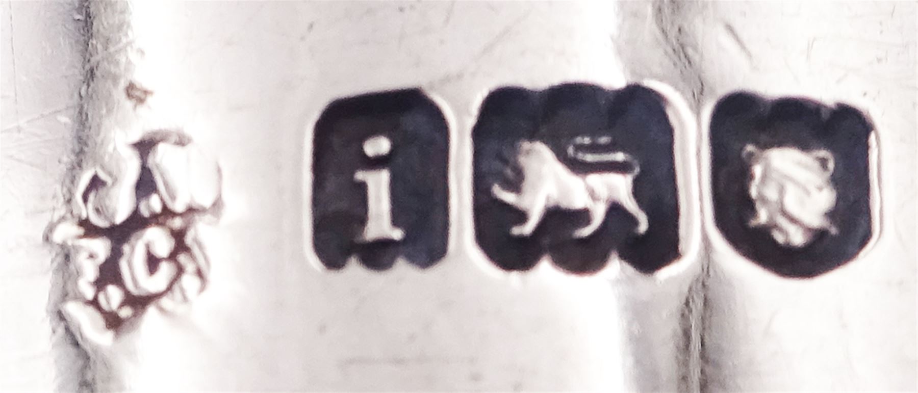 Five silver napkin rings, each of circular form, two examples with engine turned decoration, one Victorian example hallmarked Robert Thornton Birmingham 1869, a pair of Edwardian examples hallmarked T H Hazlewood & Co, Birmingham 1917, etc., approximate total weight 4.16 ozt (129.4 grams)

