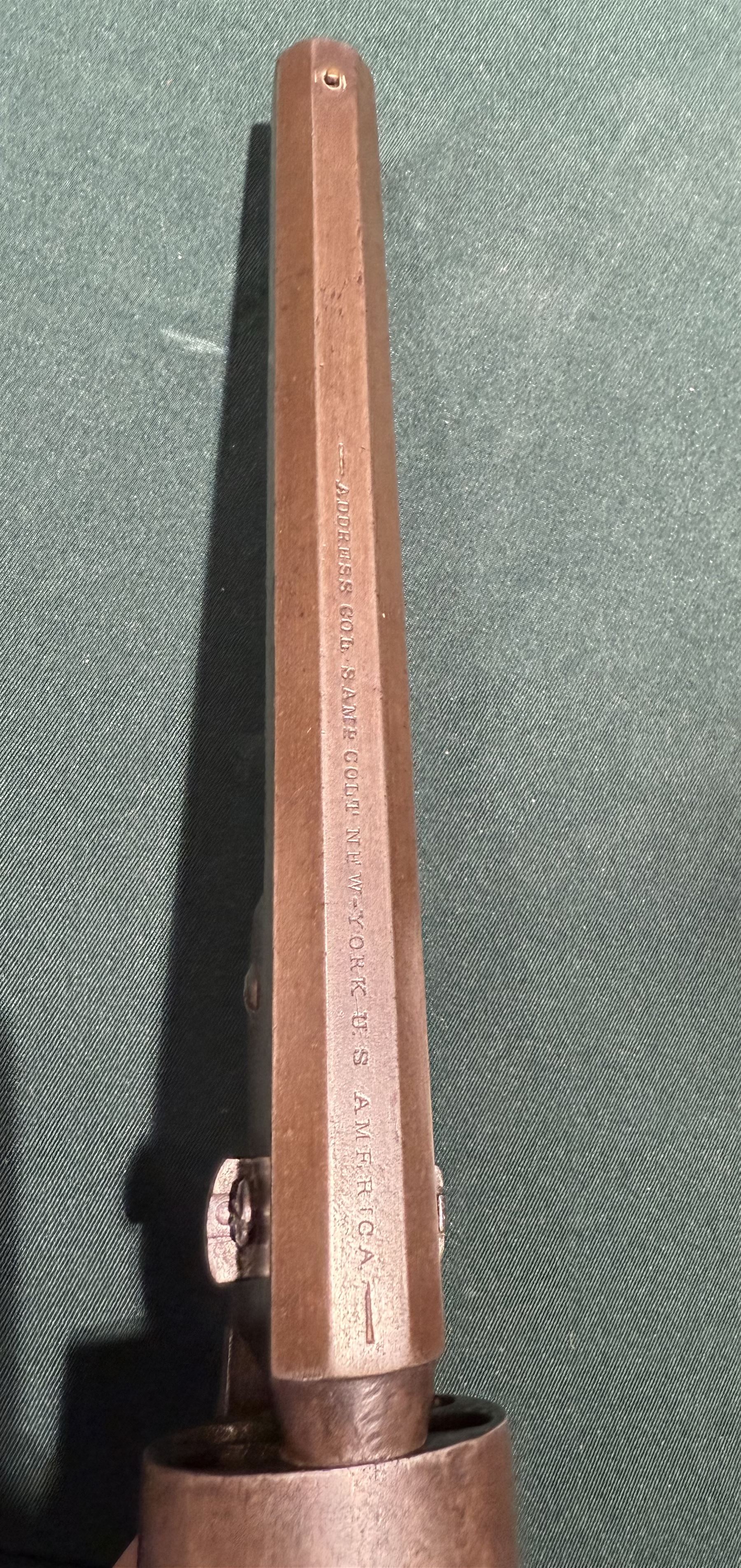 Colt .36 navy percussion revolver, with octagonal 7 1/2in. barrel top flat marked Address Col Samd Colt New York US America, frame stamped `Colts Patent' matching serial numbers, 112625, iron frame marked Colts Patent, brass grip-straps and trigger guard, smooth flared walnut grip, overall L33cm