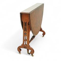 John Taylor & Son, Edinburgh - Late Victorian Aesthetic style walnut Sutherland table, with a hinged oval top on fret carved support, stamped John Taylor & Son Edinburgh, supported by scrolled feet on ceramic castor (Extended 105cm)