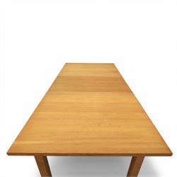 Contemporary teak dining suite comprising extending table and eight chairs, the table with rectangular plank top and one additional leaf extending to 210cm, supported on square tapering legs, the chairs with tall slatted backs and cream upholstered seats