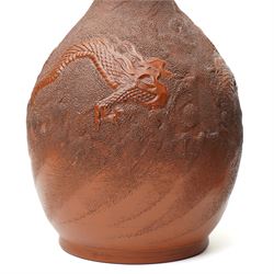 Pair of Chinese redware vases in the Yixing style, early 20th century, decorated with dragons among clouds, one bearing impressed marks to base, H30cm (2)