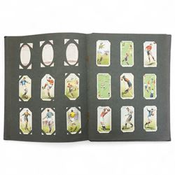 Cigarette card album and contents including set of 50 Players tennis, Hints on Association Football etc