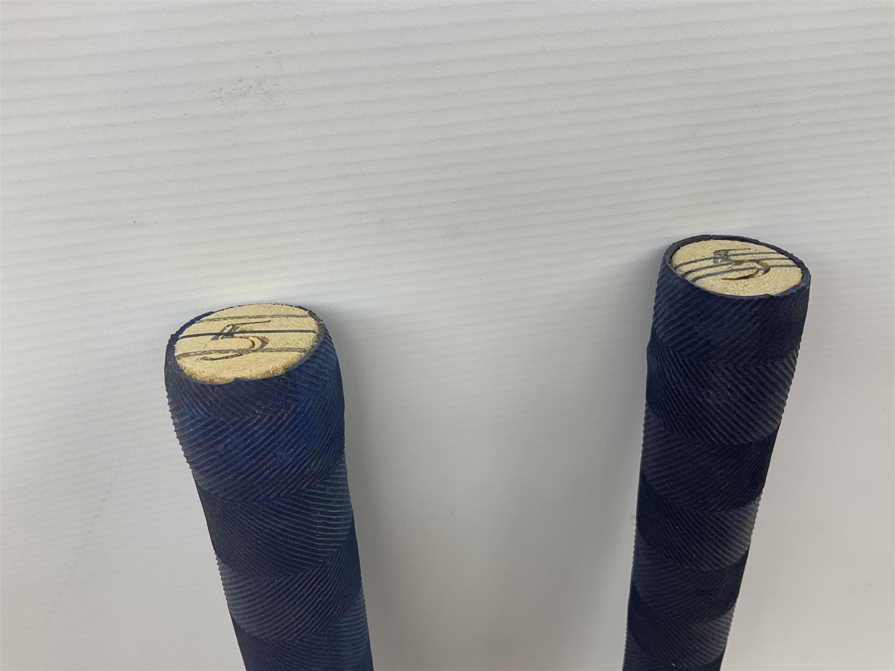 Two signed Yorkshire County cricket bats, from 2013 and 2014 seasons, bearing signatures including Johnny Bairstow, Joe Root, Tim Bresnan, Andrew Gale, etc