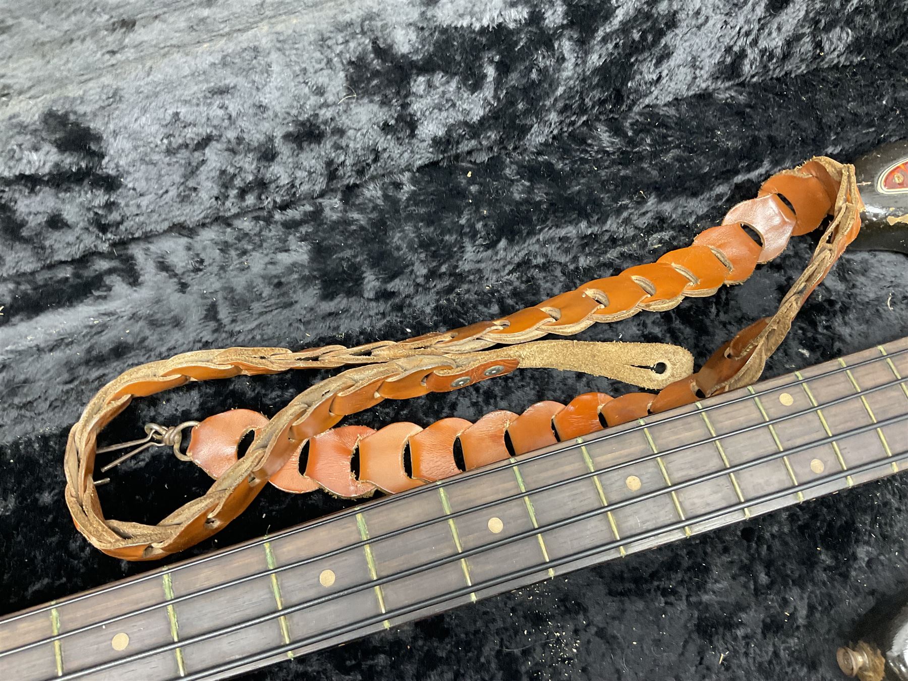 Early 1960s American Fender Precision electric bass guitar with original three-tone sunburst finish and faux tortoiseshell scratch plate; rosewood fretboard; all original fittings including chromium plated bridge and pick-up covers, finger rest, 'pots' and machines, dated on end of neck 5NOV62C, serial no.91625; L115cm overall; in Selmer simulated reptile skin covered carrying case. Sold with non-transferrable CITES A10 licence, certificate no.23GBA10CNKKEB, serial no.441200, dated 30th August 2023. Also included are original 1960s photographs of the band 'The Rascals' and photocopies of newspaper cuttings advertising their forthcoming performances along with a photocopy of a photograph of their television appearance on 'Opportunity Knocks' in 1967/8 (coming second to Mary Hopkins). In addition there is a reel-to-reel tape recording and USB stick of the band playing and two sheets of biographical information. Auctioneer's Note: The guitar was ordered by Trevor Parker from Pat Cornell's Music Shop, Spring Bank, Hull and imported from the USA in 1962, well before it was available in the UK. Trevor was the bass guitarist of The Rascals from Hull, later The Ides of March, who supported artists such as Elton John on the Hull circuit. Trevor played the guitar extensively until 1969 when The Rascals disbanded, he got married to Maureen and settled down to family life. Trevor sadly passed away in 2017, and after being in store for fifty-four years his widow has decided it is time for his guitar to be sold.