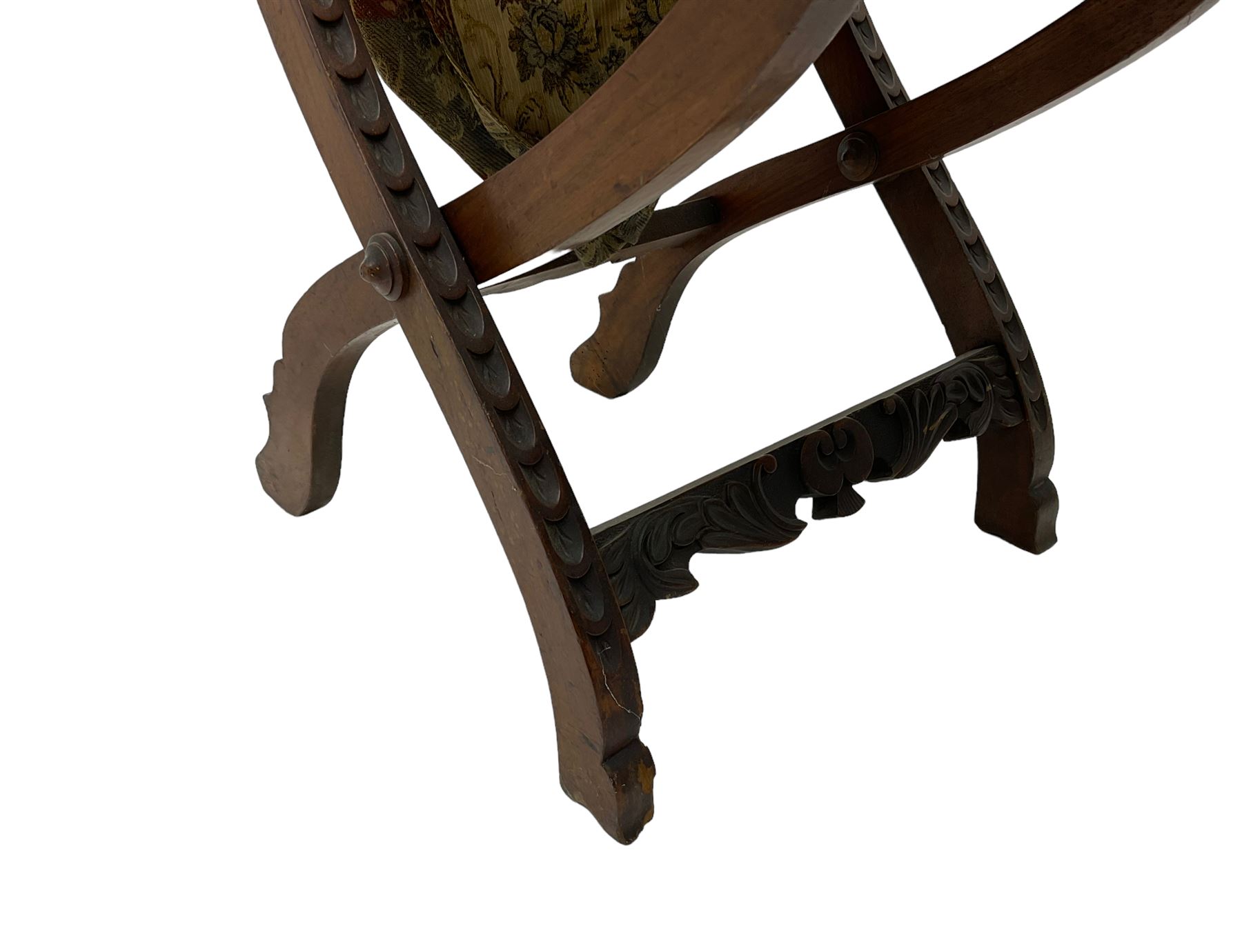 19th century carved mahogany folding chair, cresting rail carved with two stylised fish flanking a crown, spiral turned spindle supports over tapestry seat (W37cm H89); and another folding chair (W46cm H100cm)