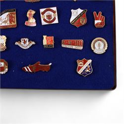 Twenty-one Manchester United enamel pin badges, including 1968 European Cup Winners example and a 1977 FA Jubilee Cup Winners example