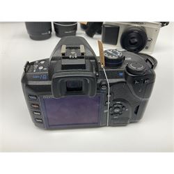 Olympus E-520 camera body, serial no. G27518842, with 'Olympus Zuiko Digital 14-42mm 1:3,5-5,6' lens, serial no. 212656796, Olympus E P1 camera body, serial no. H46518215, with 'Panasonic Lumix G1:2.5/14ASPH' lens, Olympus Pen Lite E-PL5, serial no. BFU507430, with 'Panasonic Lumix G 1:1 7/20 ASPH' lens, together with a collection of Olympus lenses, to include 'Olympus Zuiko Digital 25mm 1:2.8' lens serial no. 292017627, 'Olympus Zuiko Digital 9-18mm 1:4-5.6' lens, serial no. 300204427 