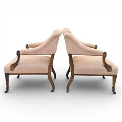 Quality Edwardian seven piece inlaid salon suite, comprising three seater settee, pair of arm chairs and four chairs with pierced splat backs, upholstered in pale pink fabric, inlaid with flowering urns, upon tapering legs with spade feet and castors