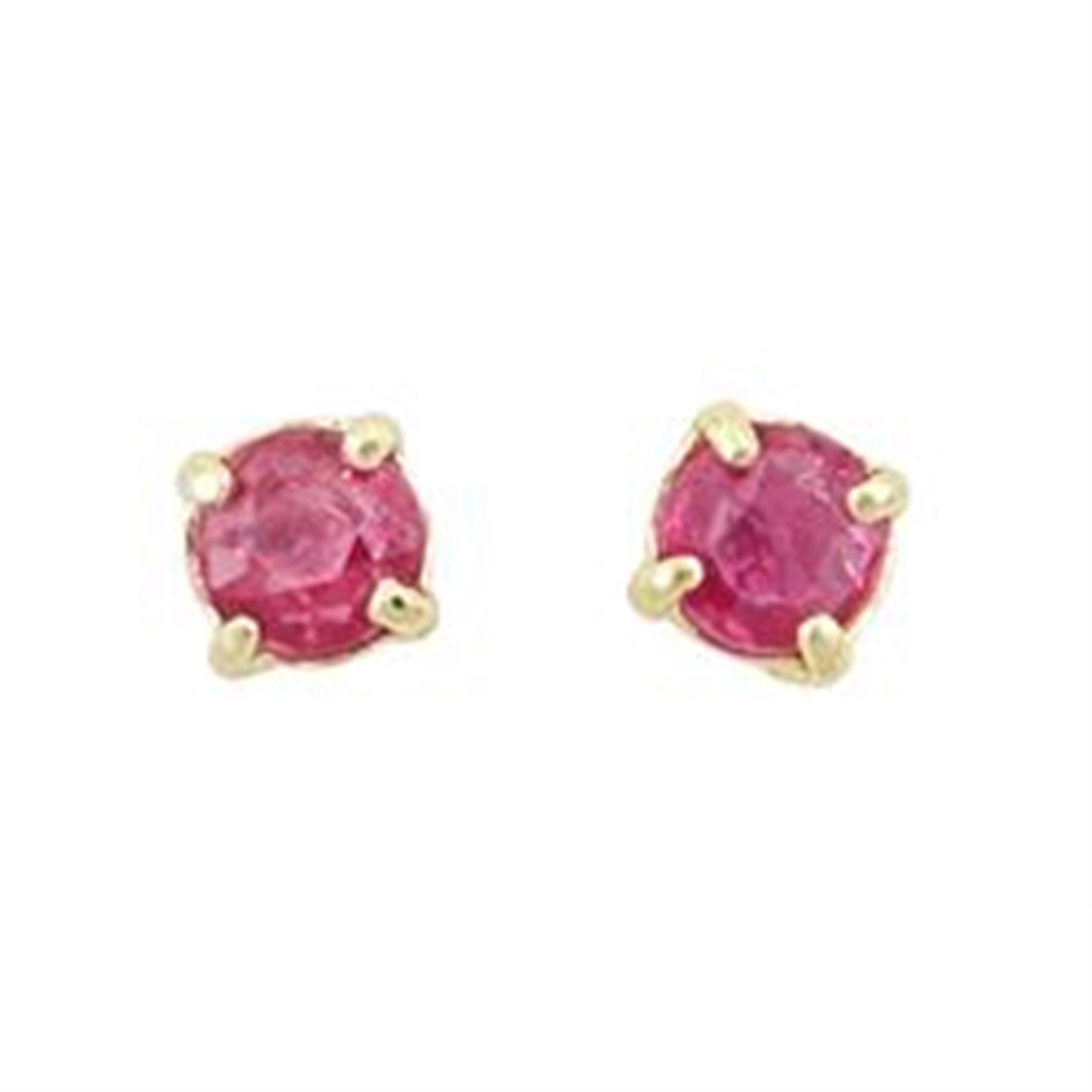 Pair of 9ct gold round cut ruby stud earrings, stamped