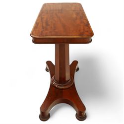 William IV mahogany reading table, the rectangular top with rounded corners and moulded edge, one end fitted with two hinged adjustable reading slops with two rests, the sliding top with a sprung stay mechanism, supported on a single tapered faceted column  with turned collar on a quatreform base with compressed bun feet