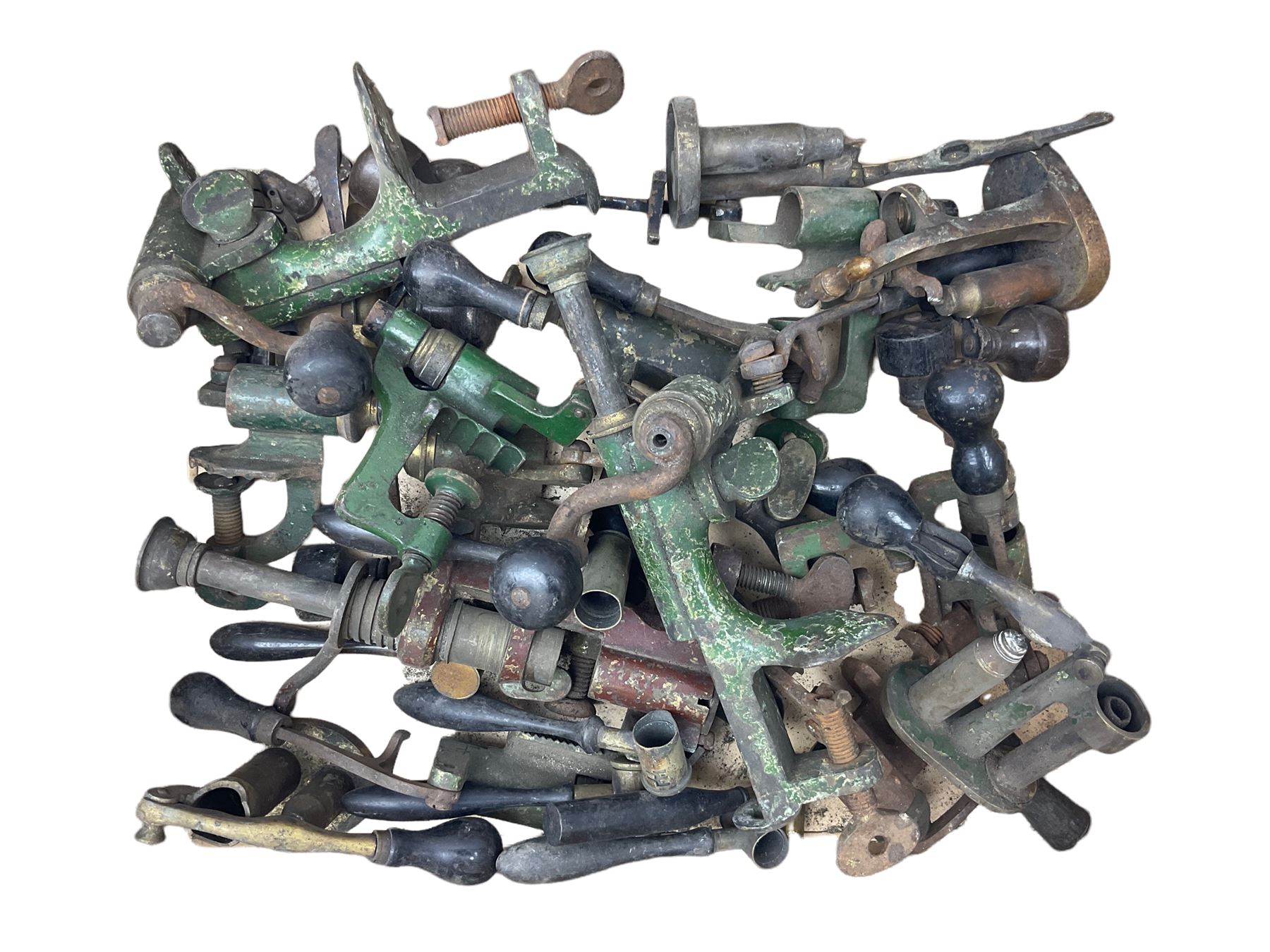 Over twenty items of shotgun cartridge making equipment including eight roll turnover tools, four re/decapping tools, six powder measures etc